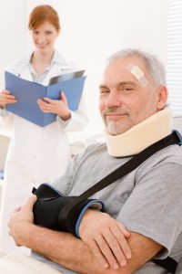 senior patient broken arm in doctor office